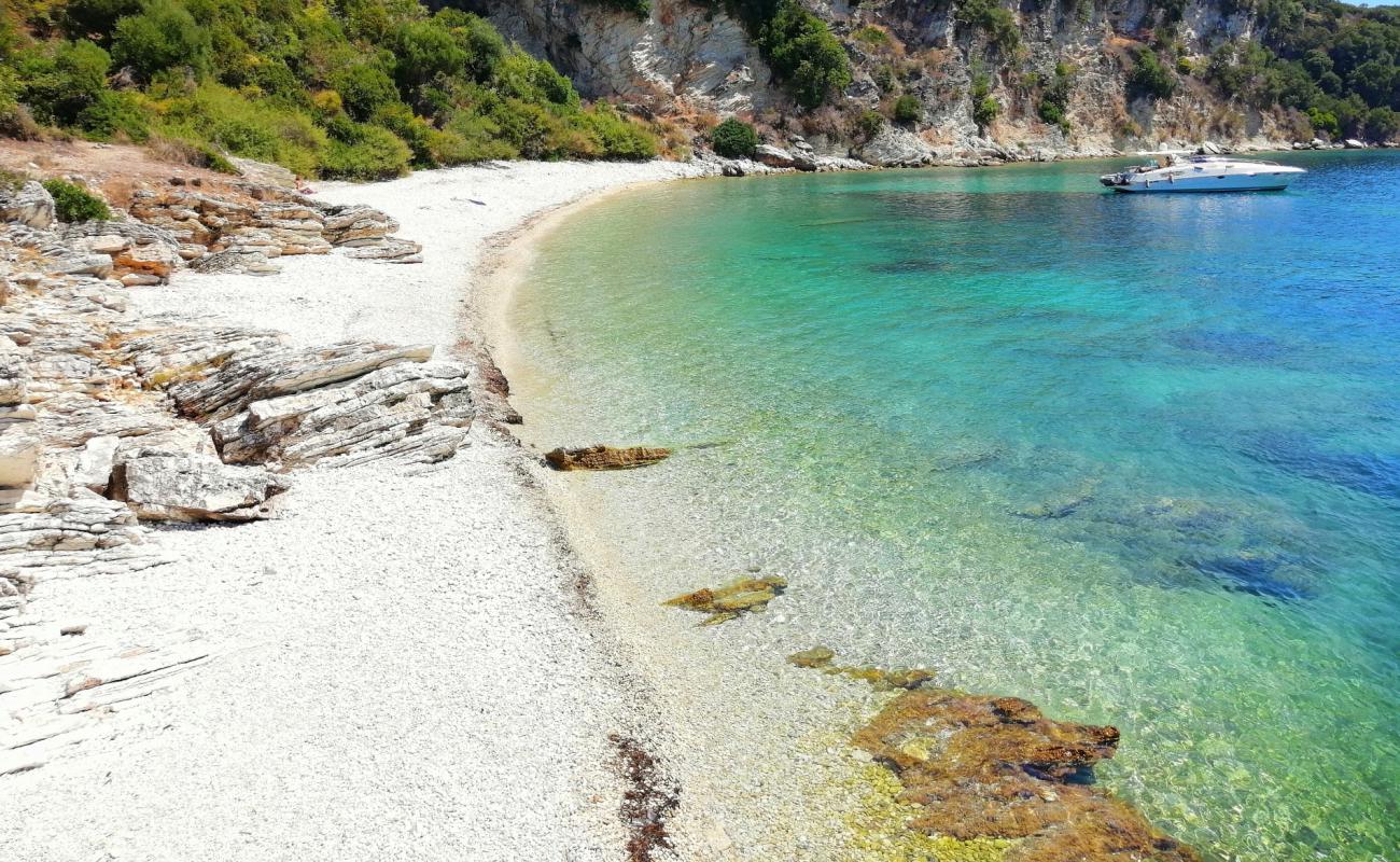 Photo of Korfu beach with white fine pebble surface