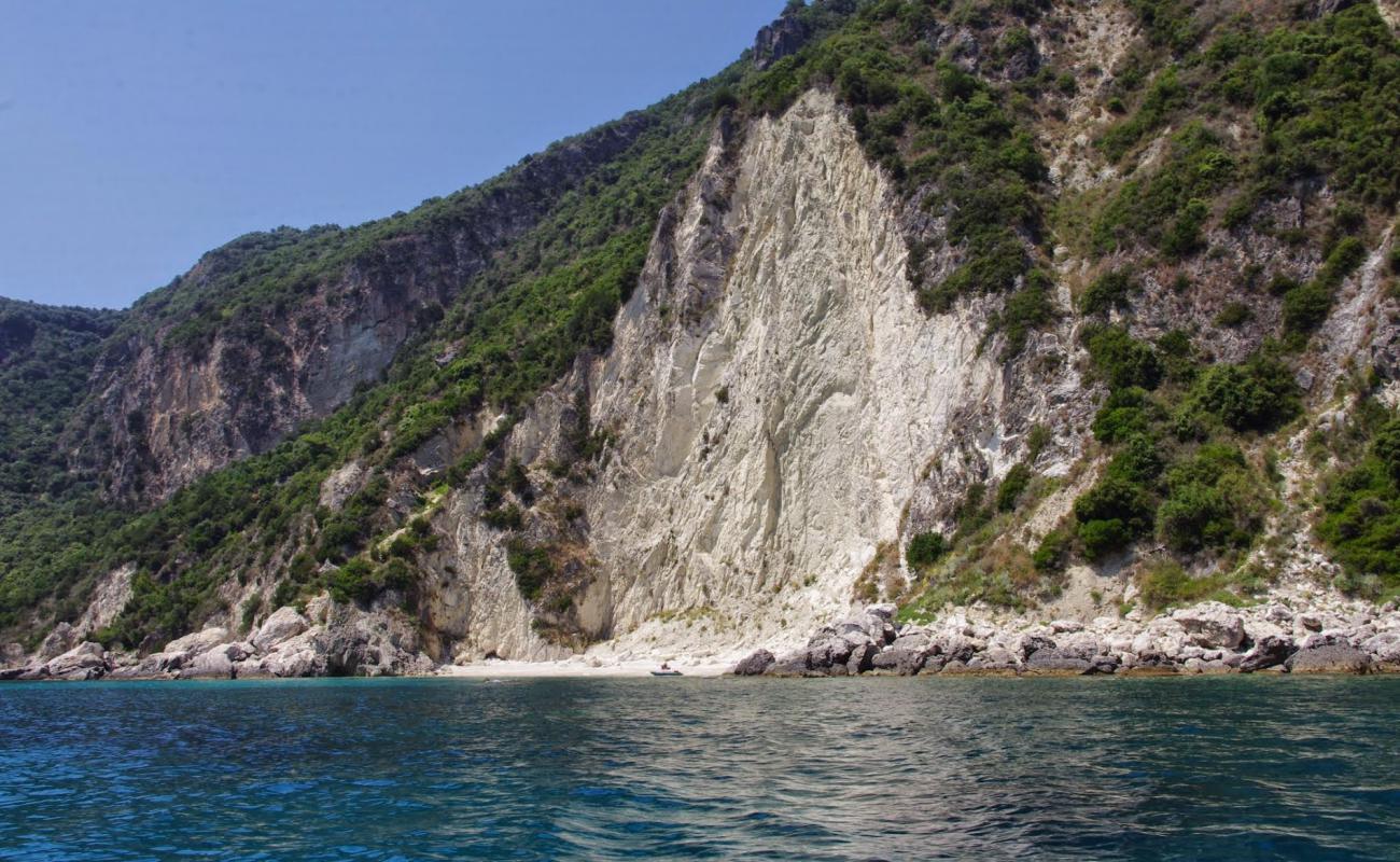 Photo of JM beach with bright shell sand surface