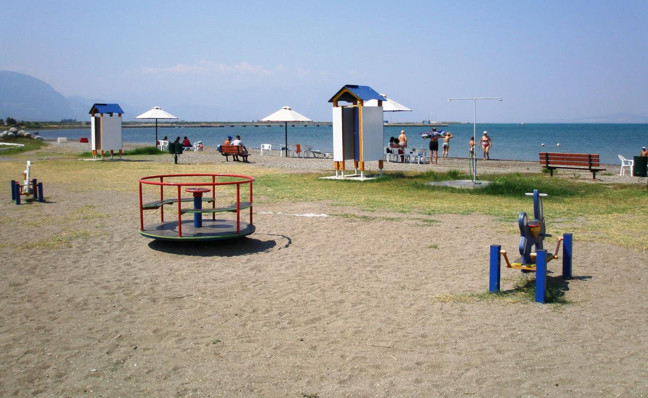 Photo of Molos beach with gray sand &  pebble surface