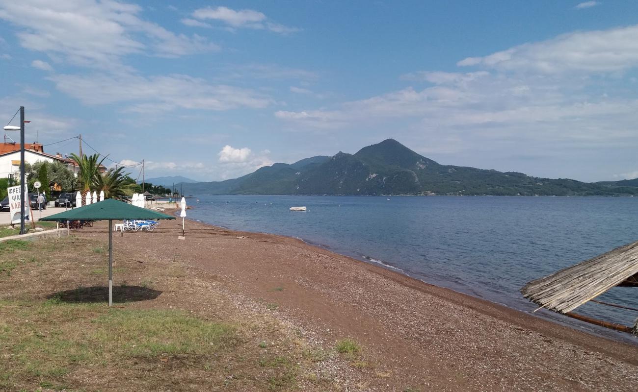 Photo of Achladi beach with black sand & pebble surface