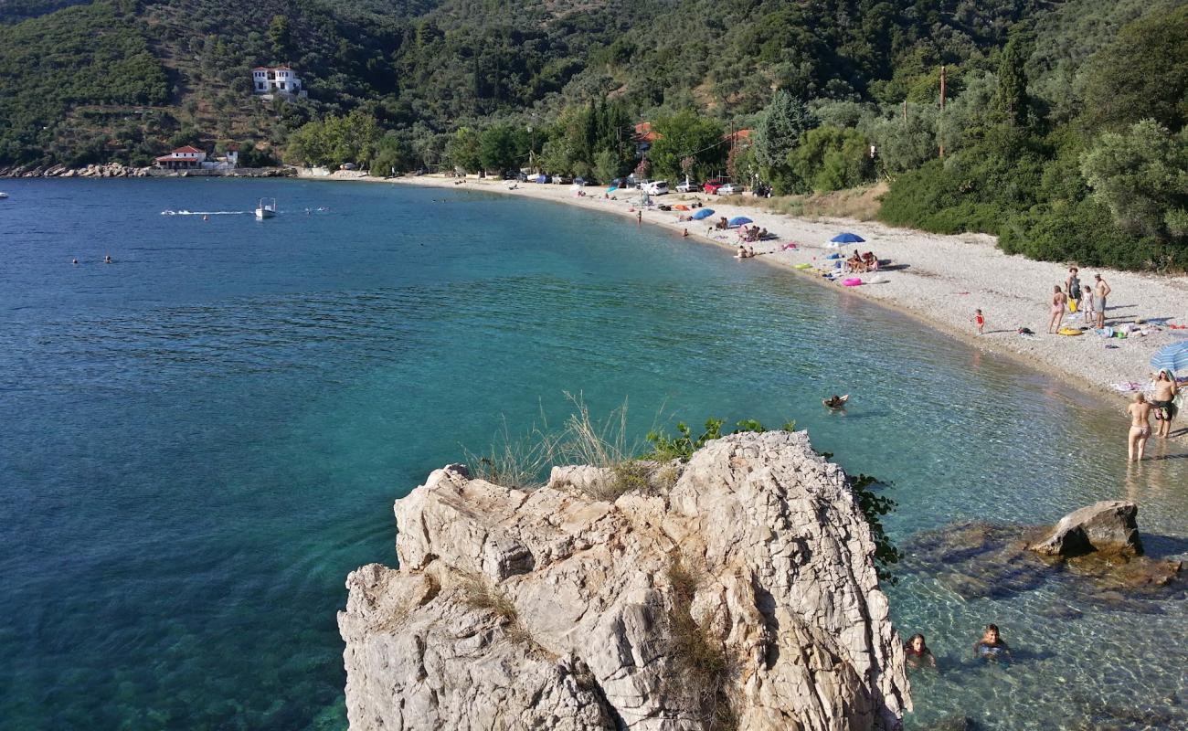 Photo of Paou beach with bright sand & rocks surface