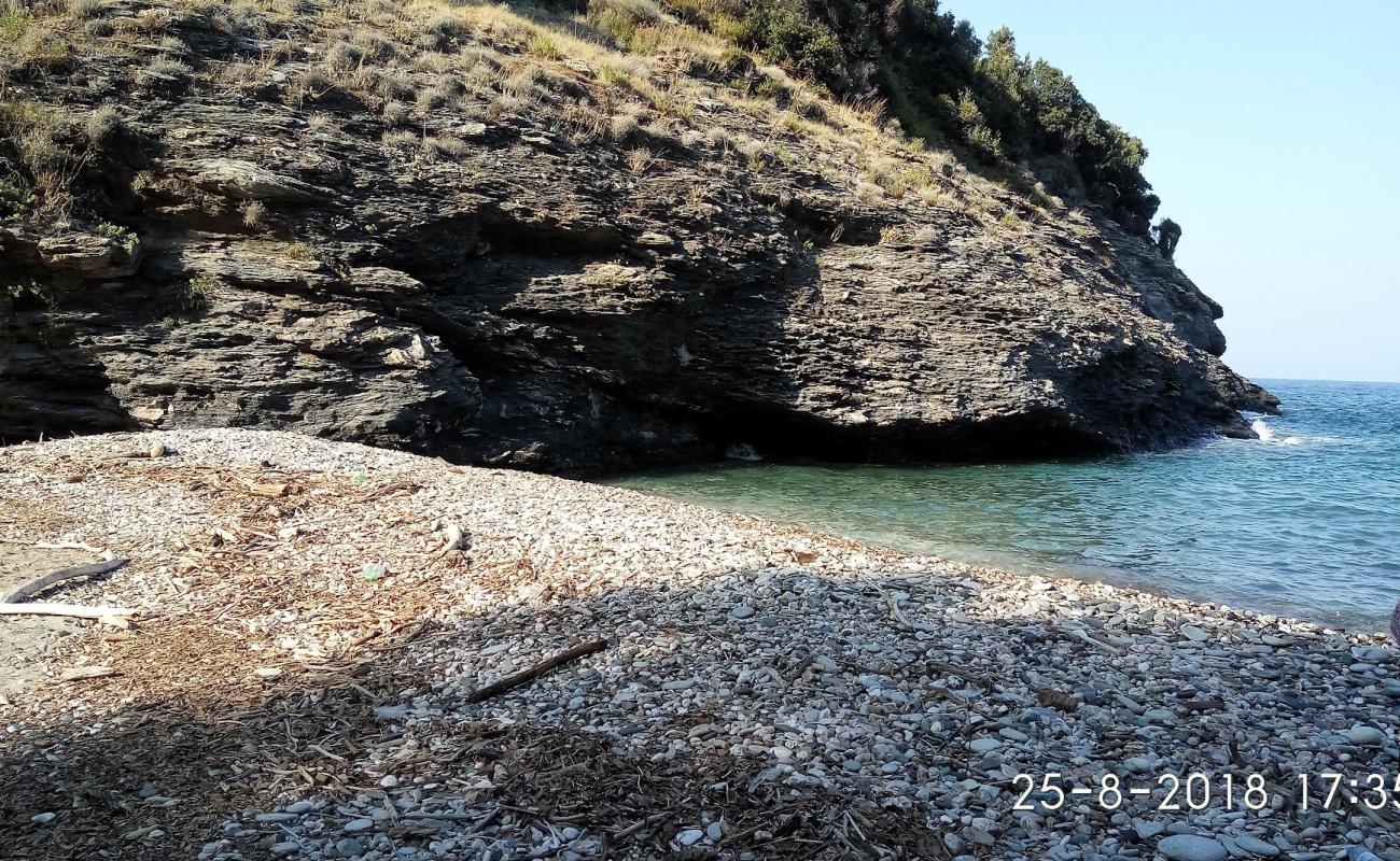 Photo of Placa wild beach with light sand &  pebble surface