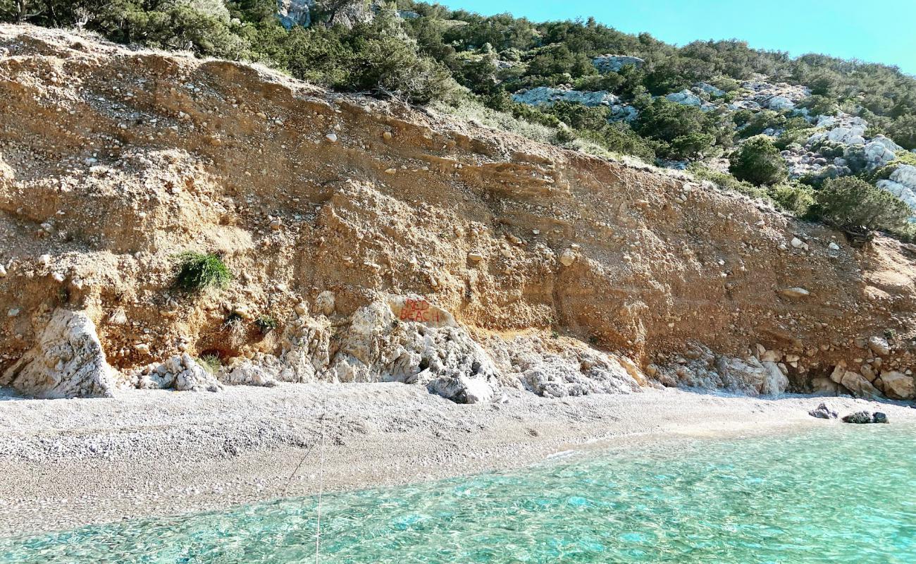 Photo of Porto Germeno secret beach with gray pebble surface