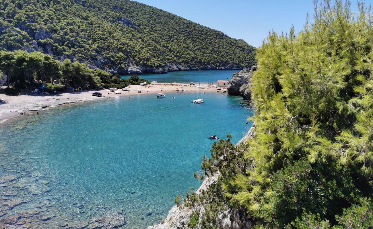 Photo of Mylokopḗ beach with brown fine pebble surface