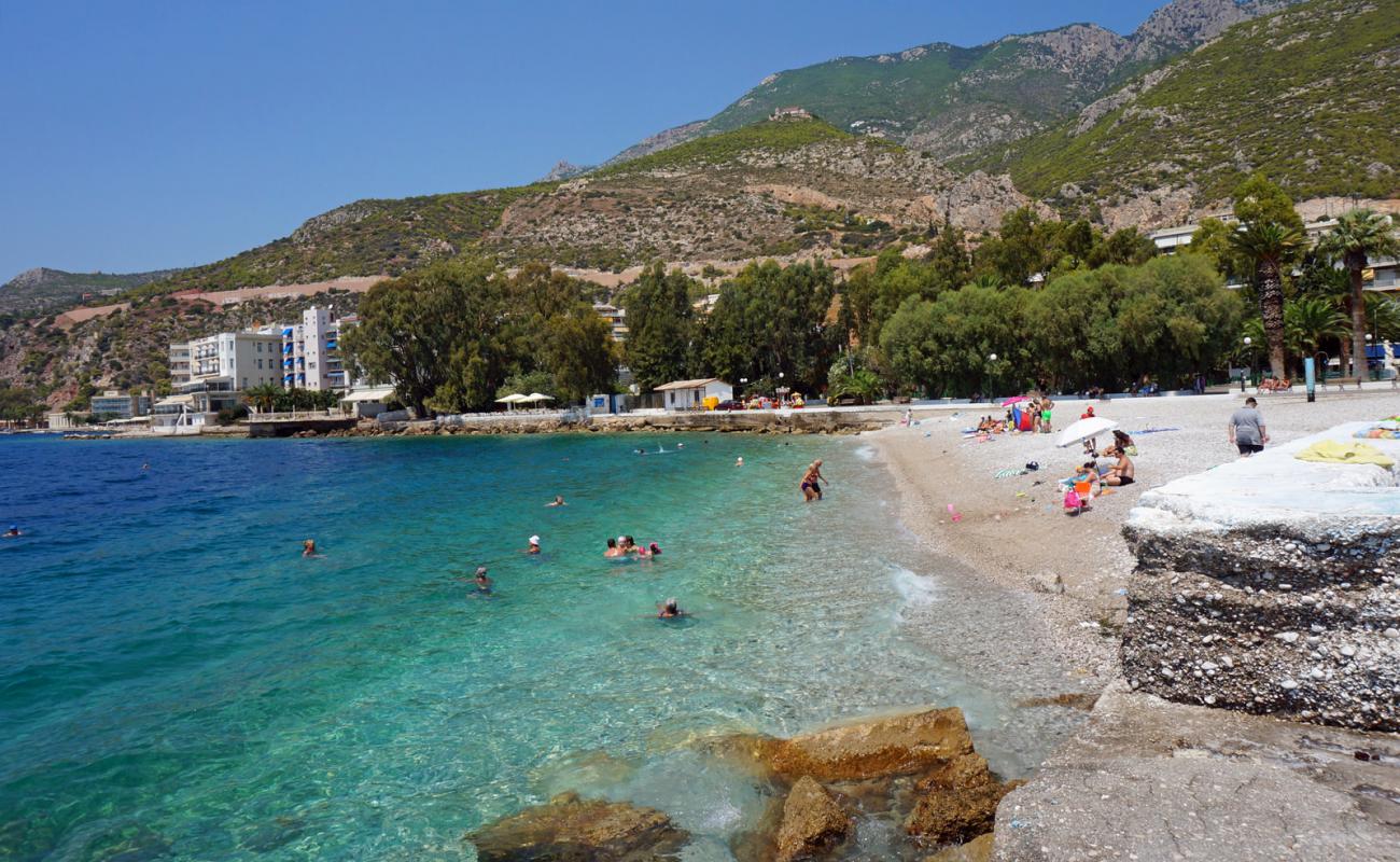 Photo of Loutraki marina beach with gray fine pebble surface