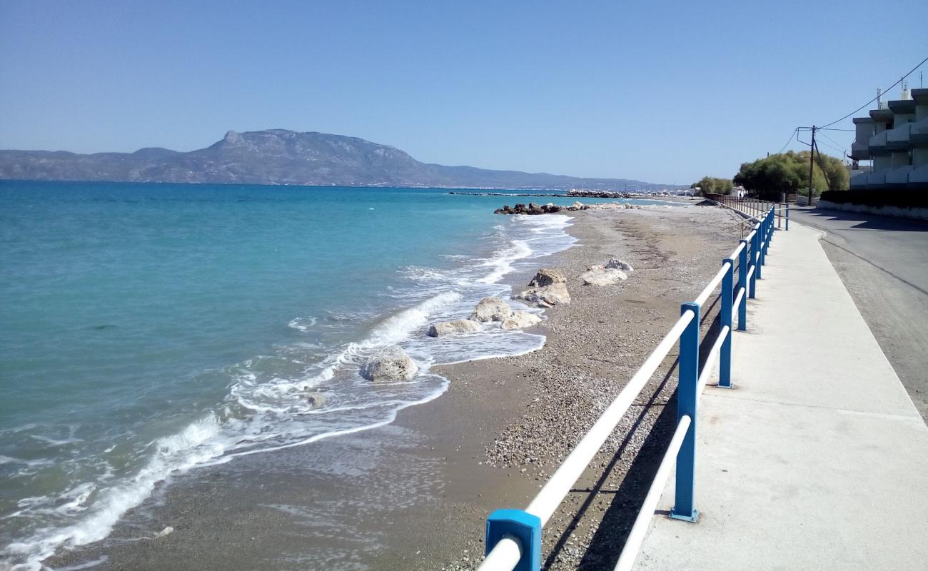 Photo of Agiou Panteleimonos with gray sand &  pebble surface