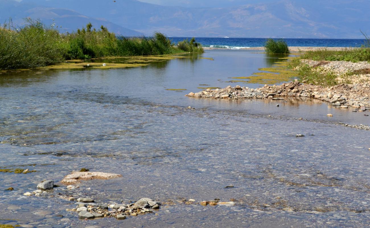 Photo of Paralia Vouraikos with gray sand &  pebble surface