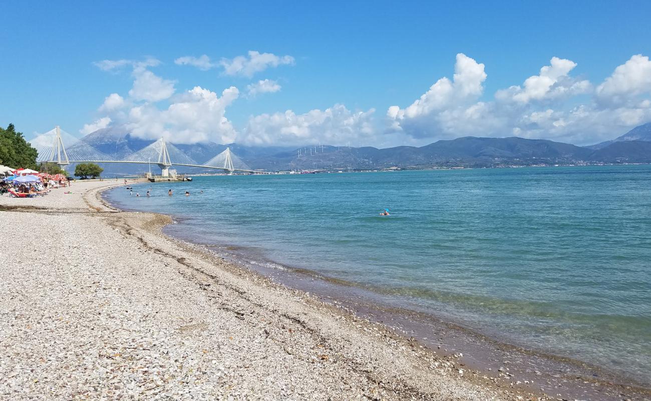 Photo of Paralia Aktaiou with brown pebble surface