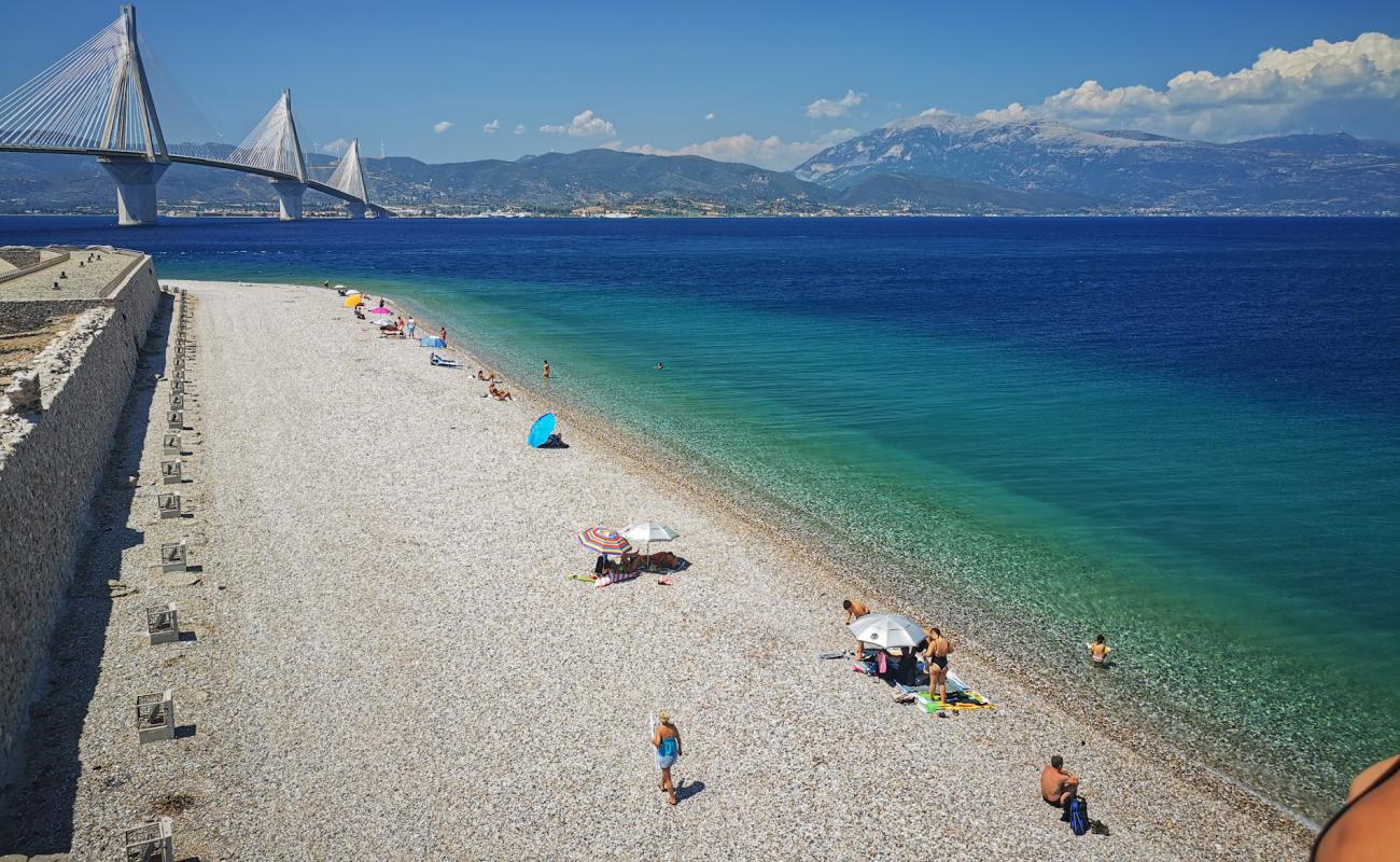 Photo of Paralia Aktaiou II with brown pebble surface