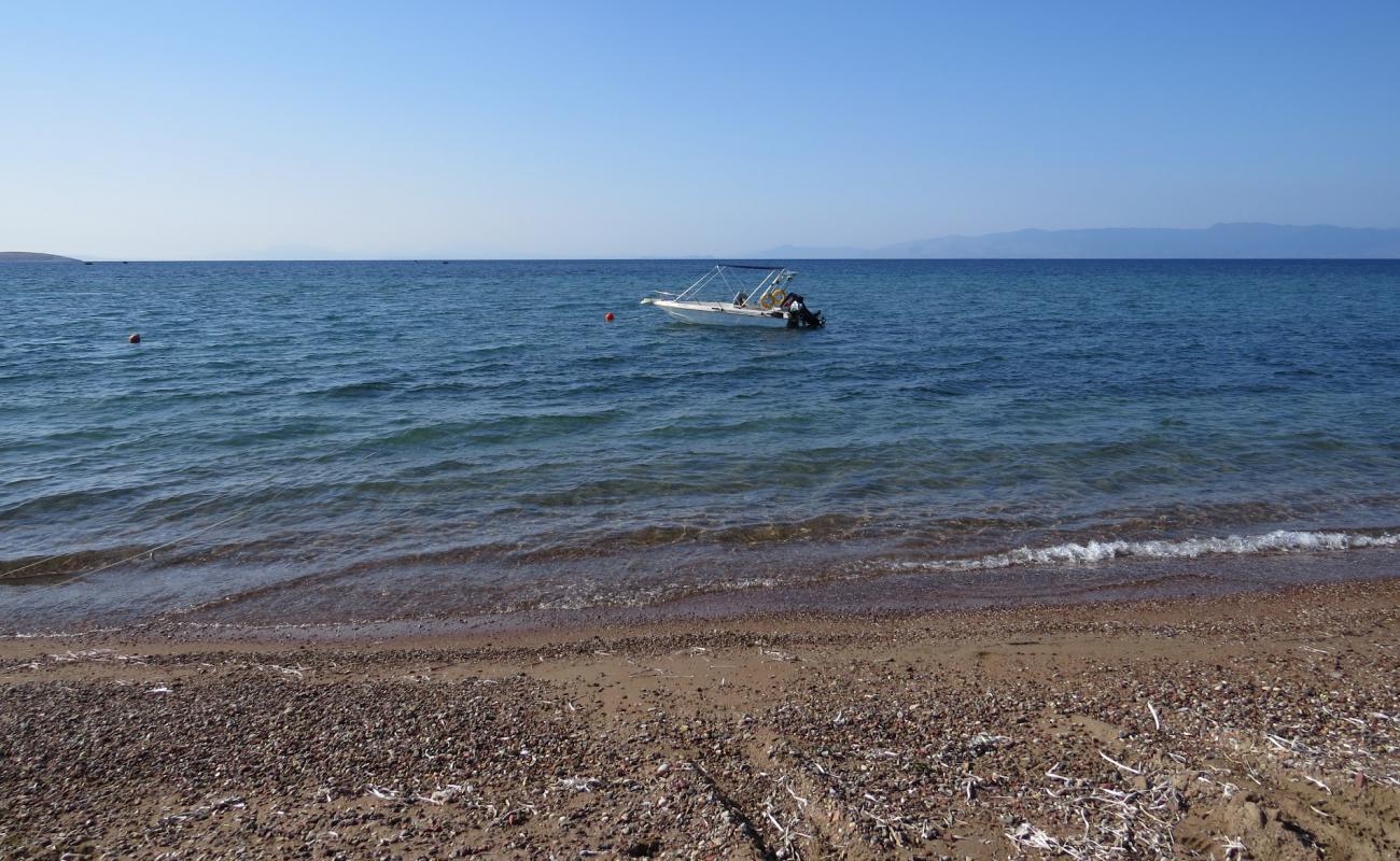 Photo of Limanaki with black sand & pebble surface