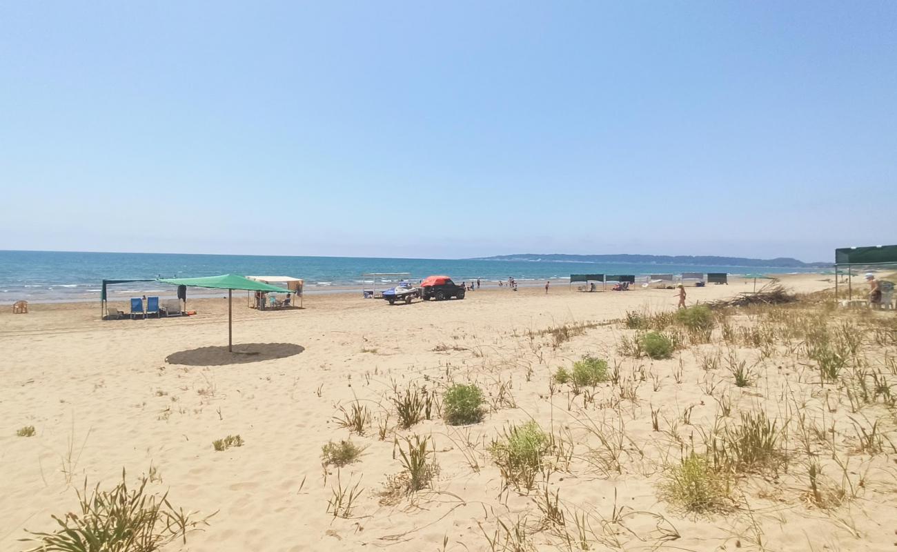 Photo of Letrina beach with bright fine sand surface