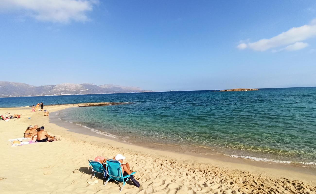 Photo of Pouda beach with bright fine sand surface