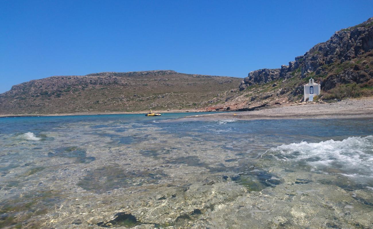 Photo of Aglyftis beach with rocks cover surface