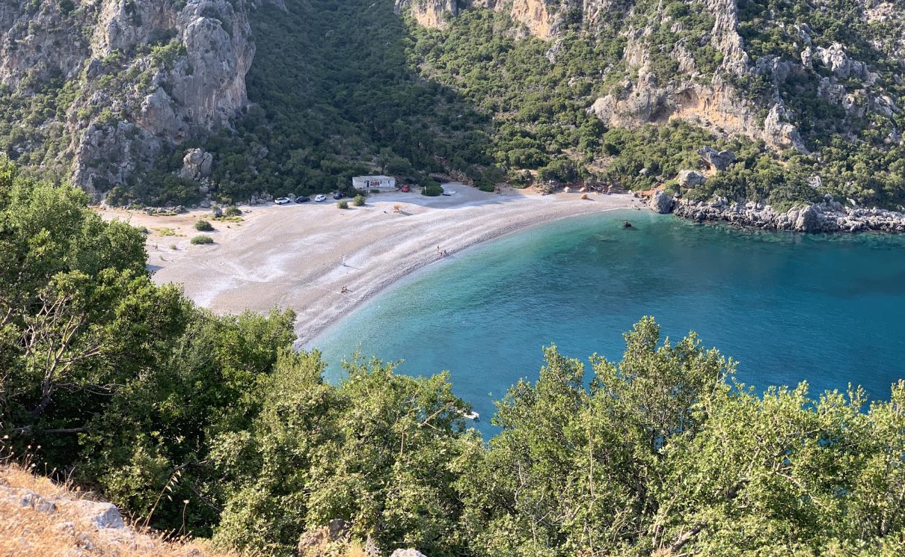 Photo of Vlychada beach with gray pebble surface