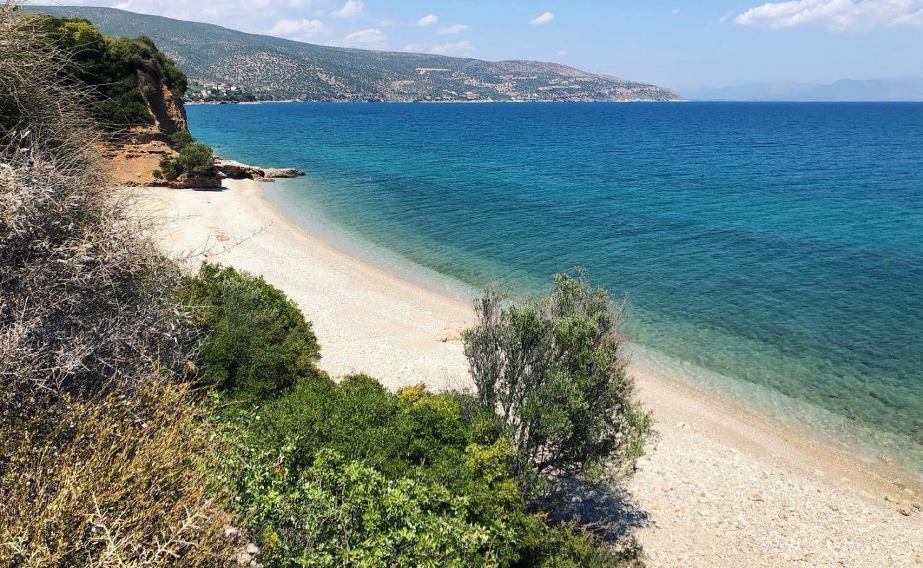 Photo of Tapia beach with brown pebble surface