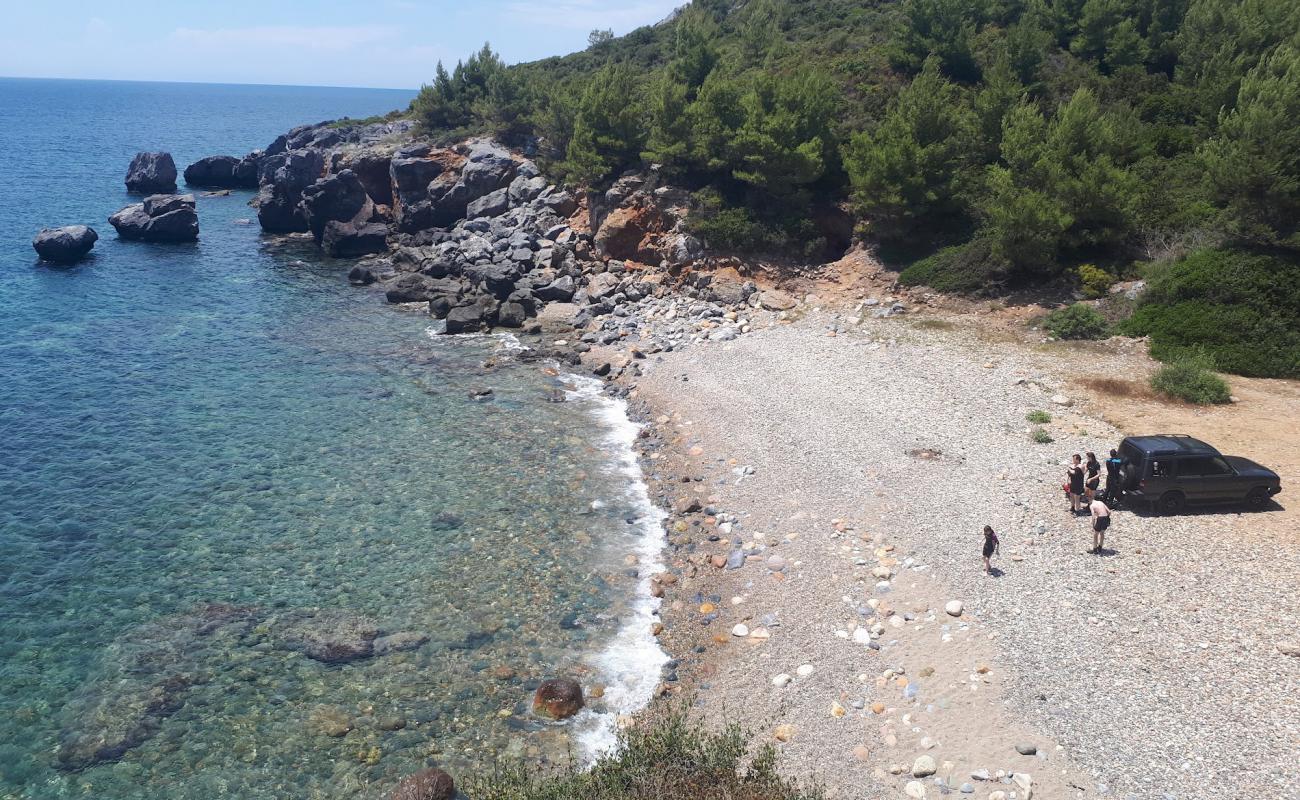 Photo of Ani beach with bright sand & rocks surface