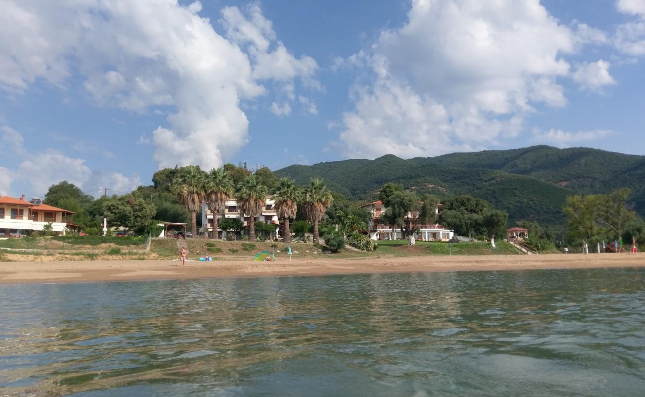 Photo of Karvounoskala Beach with gray sand surface