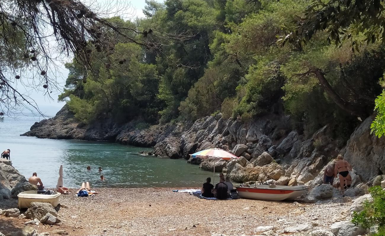 Photo of Agkali secret beach with brown fine pebble surface