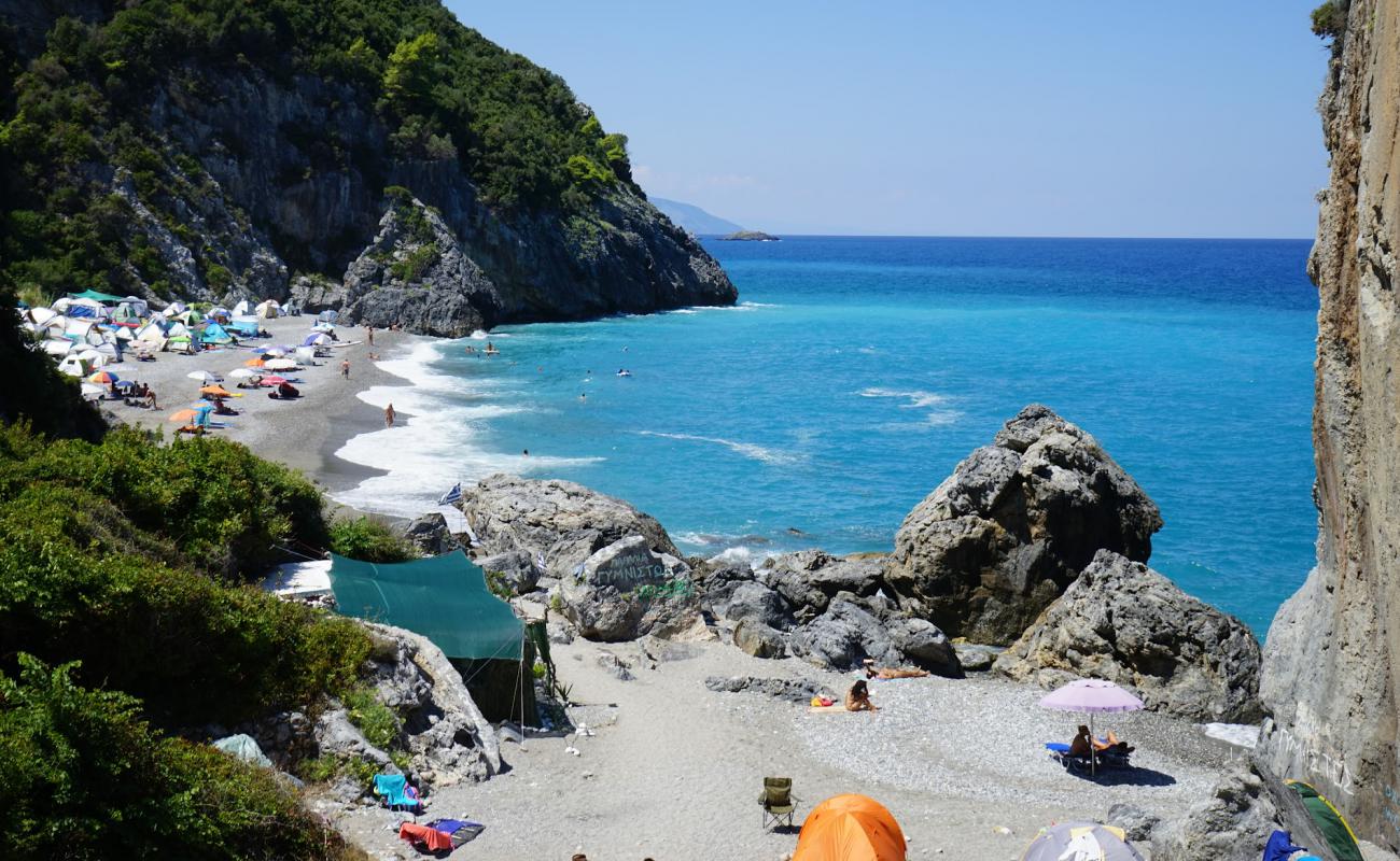 Photo of Xiliadoy nude beach with gray fine pebble surface