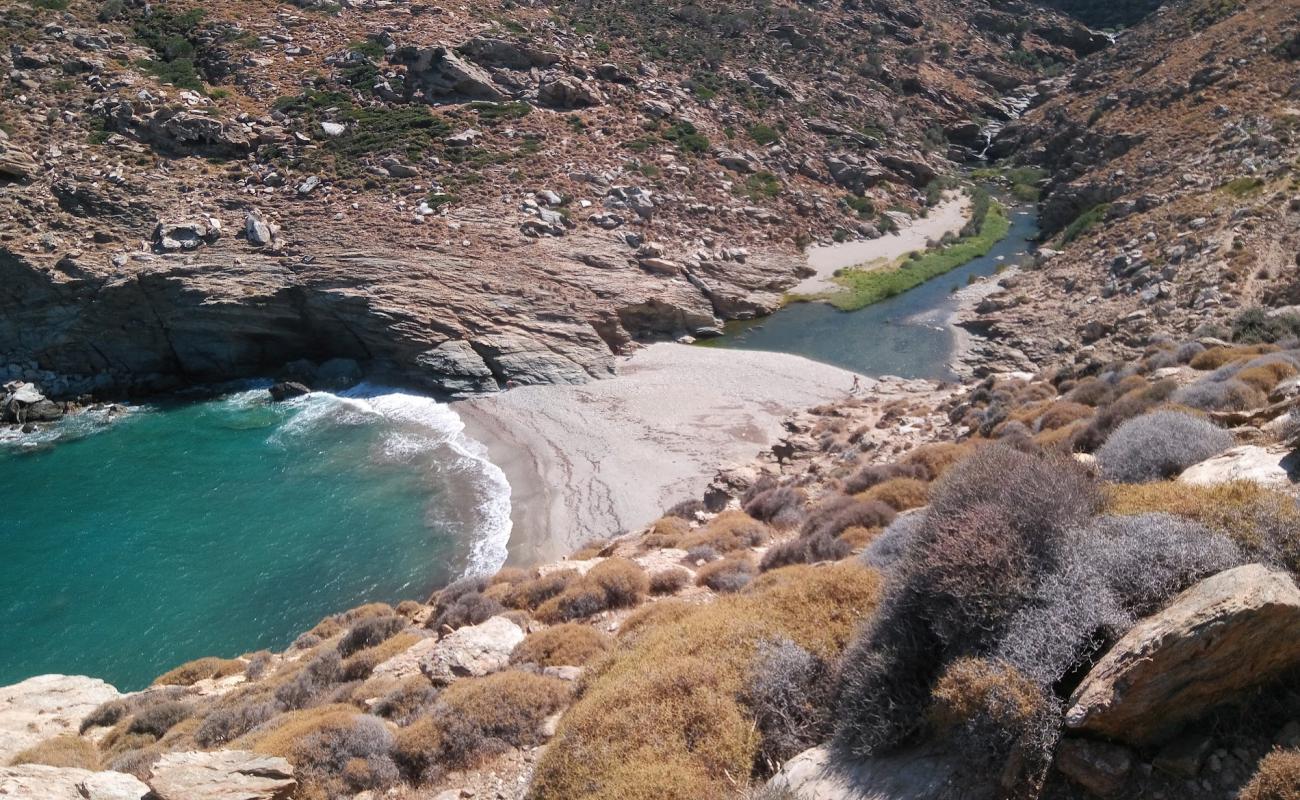 Photo of River beach with bright shell sand surface