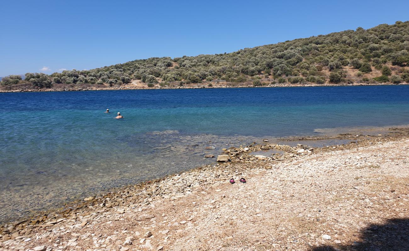 Photo of Mpoufalo beach with brown sand &  rocks surface