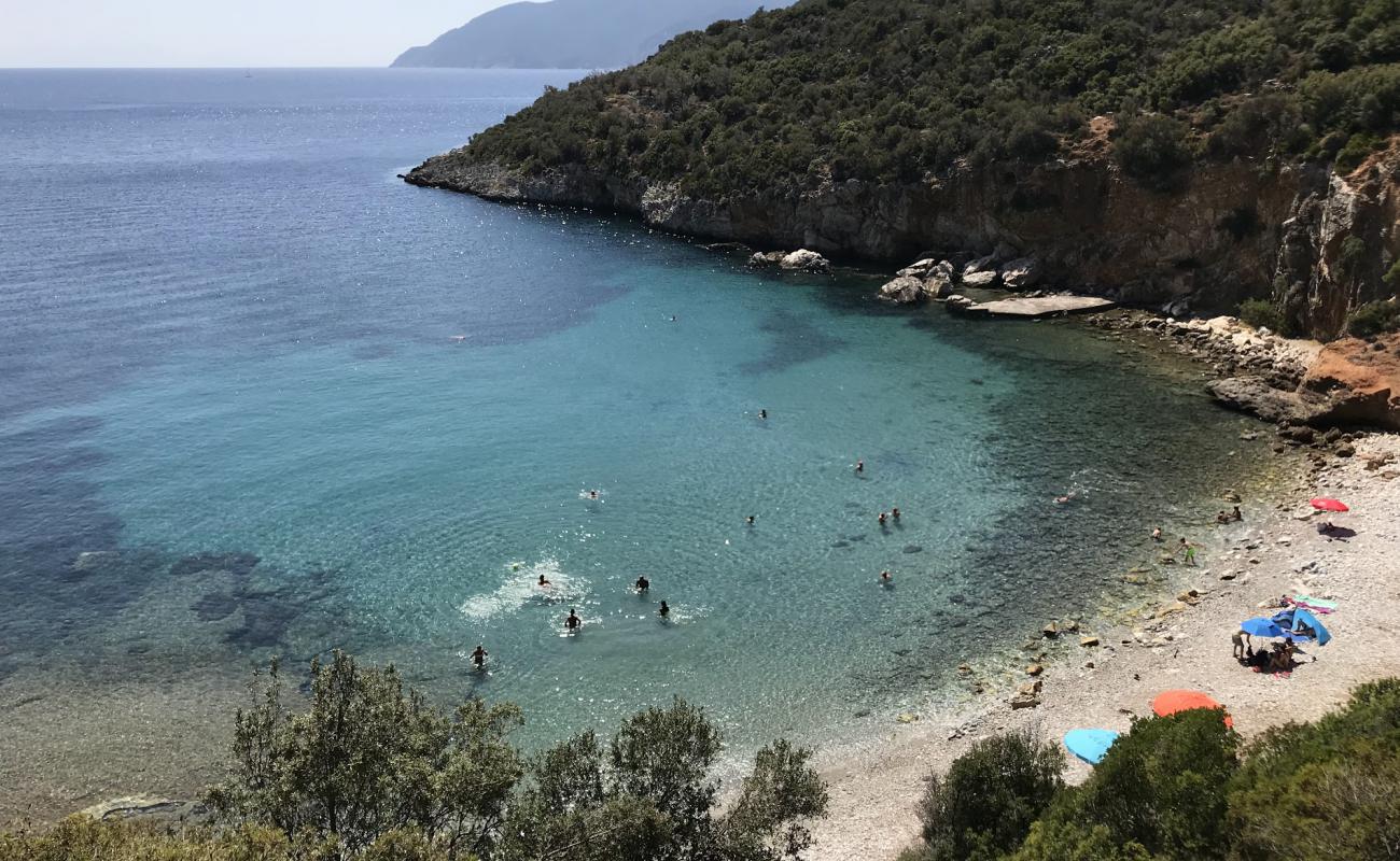 Photo of Mikros Mourtias with gray sand &  rocks surface