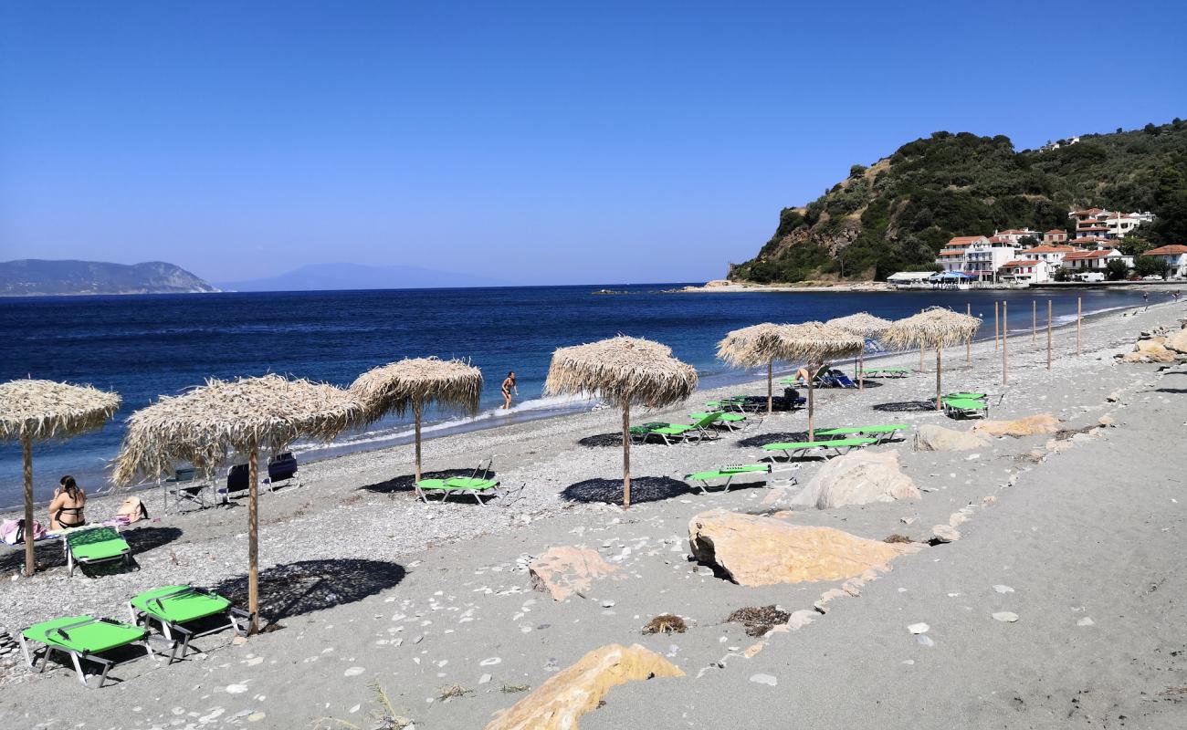 Photo of Loutraki beach with gray sand &  pebble surface