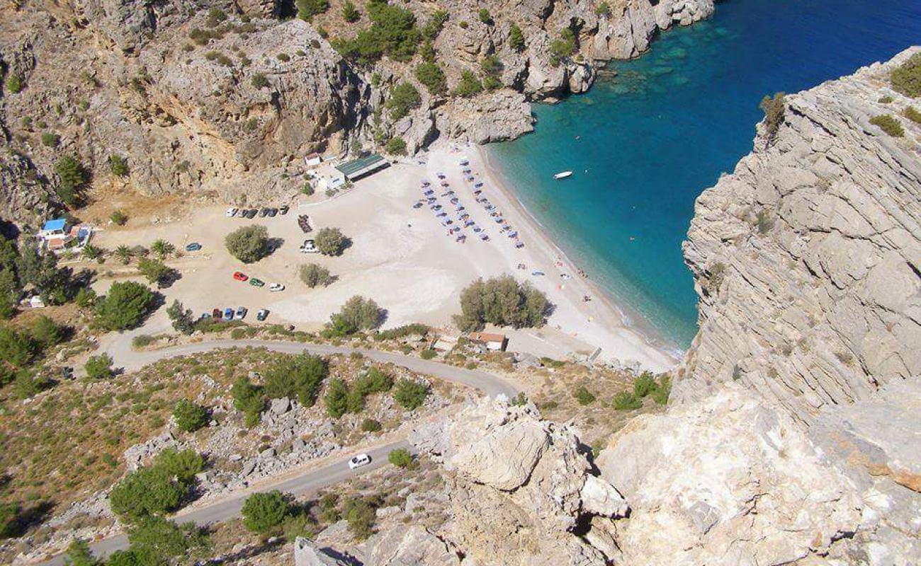 Photo of Achata beach with light fine pebble surface