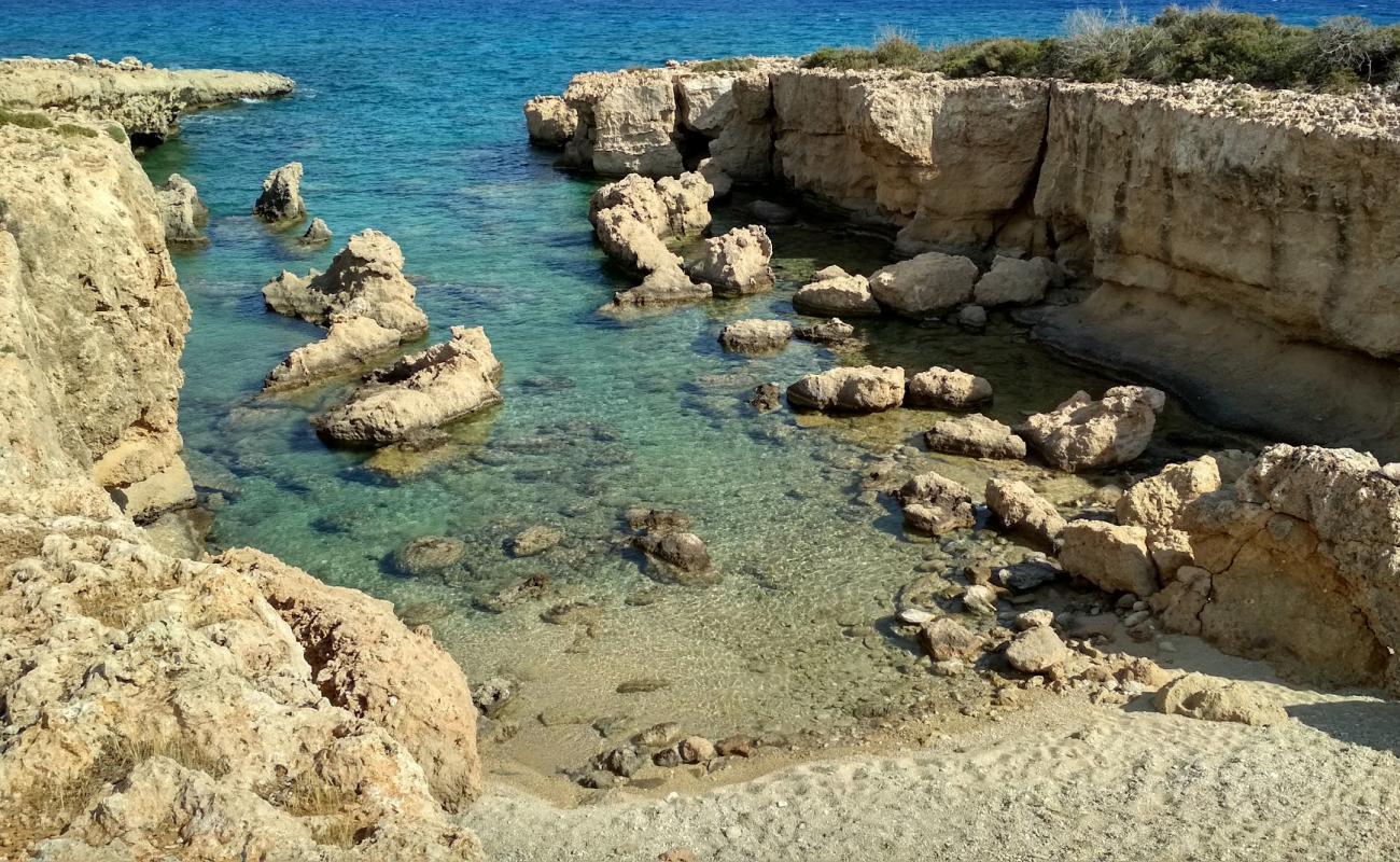 Photo of Pouliou beach with bright sand & rocks surface