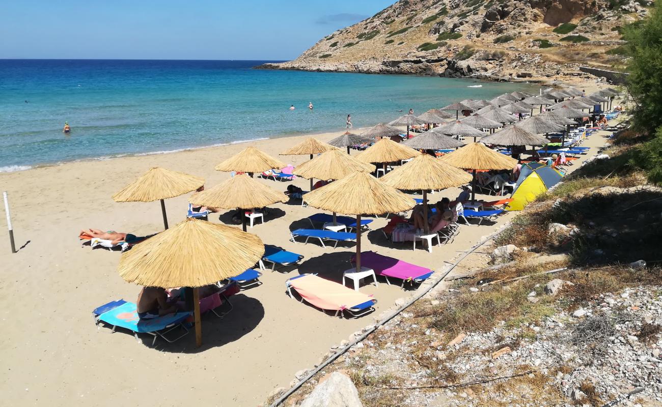 Photo of Agios Nikolaos beach with brown fine sand surface