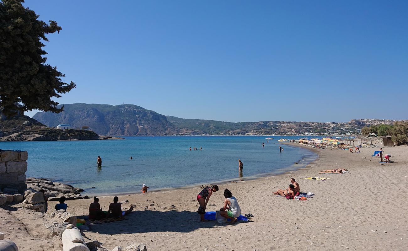 Photo of Agios Stefanos with light sand &  pebble surface