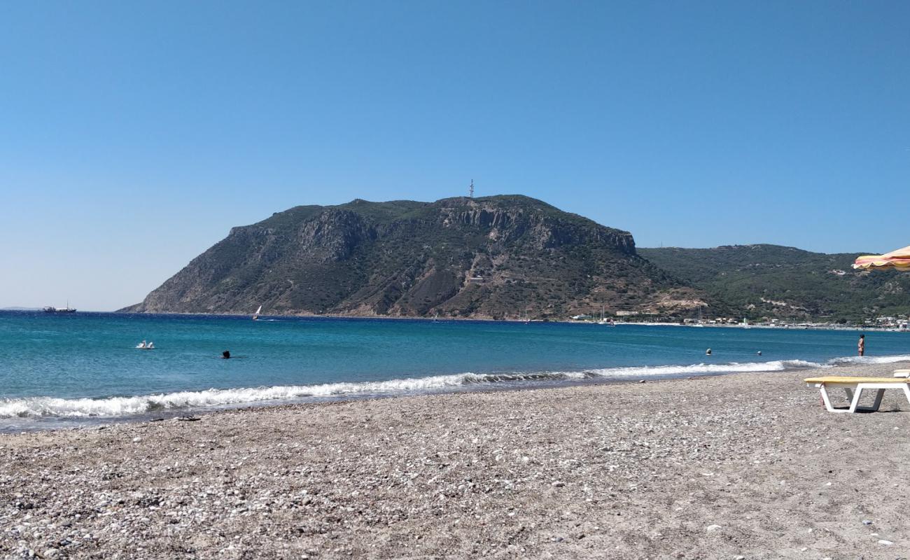 Photo of Paralia Kefalos with light sand &  pebble surface