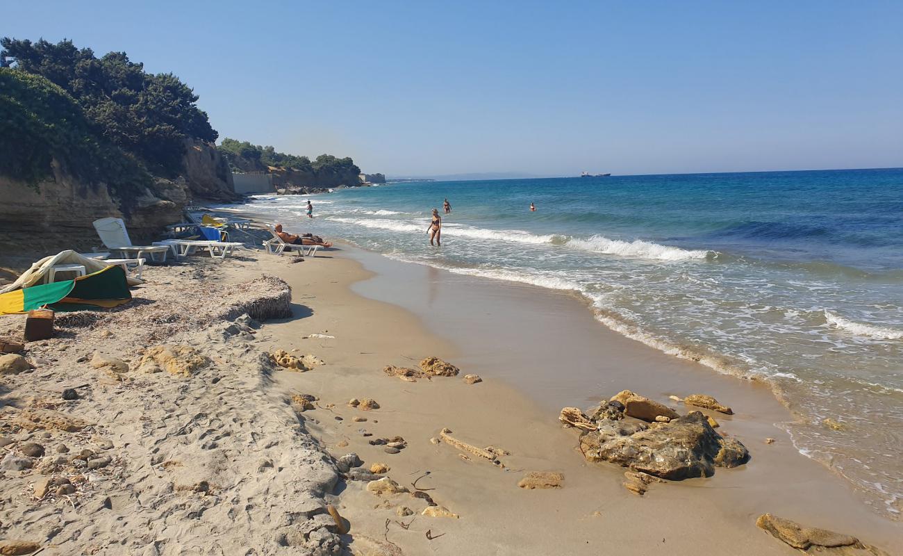 Photo of Dolphin Bay with gray sand surface