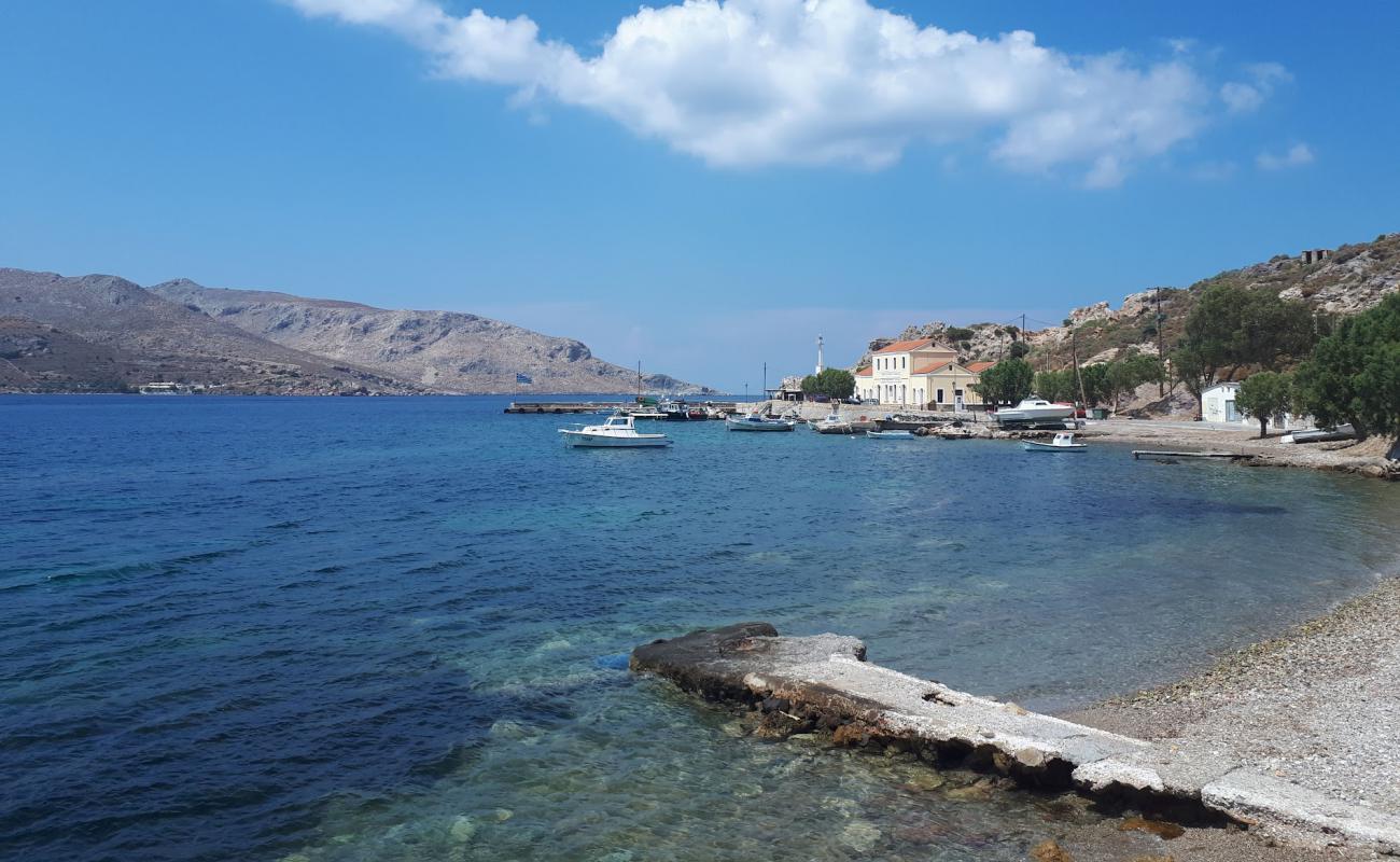 Photo of Paralia Agias Marinas II with gray sand &  rocks surface