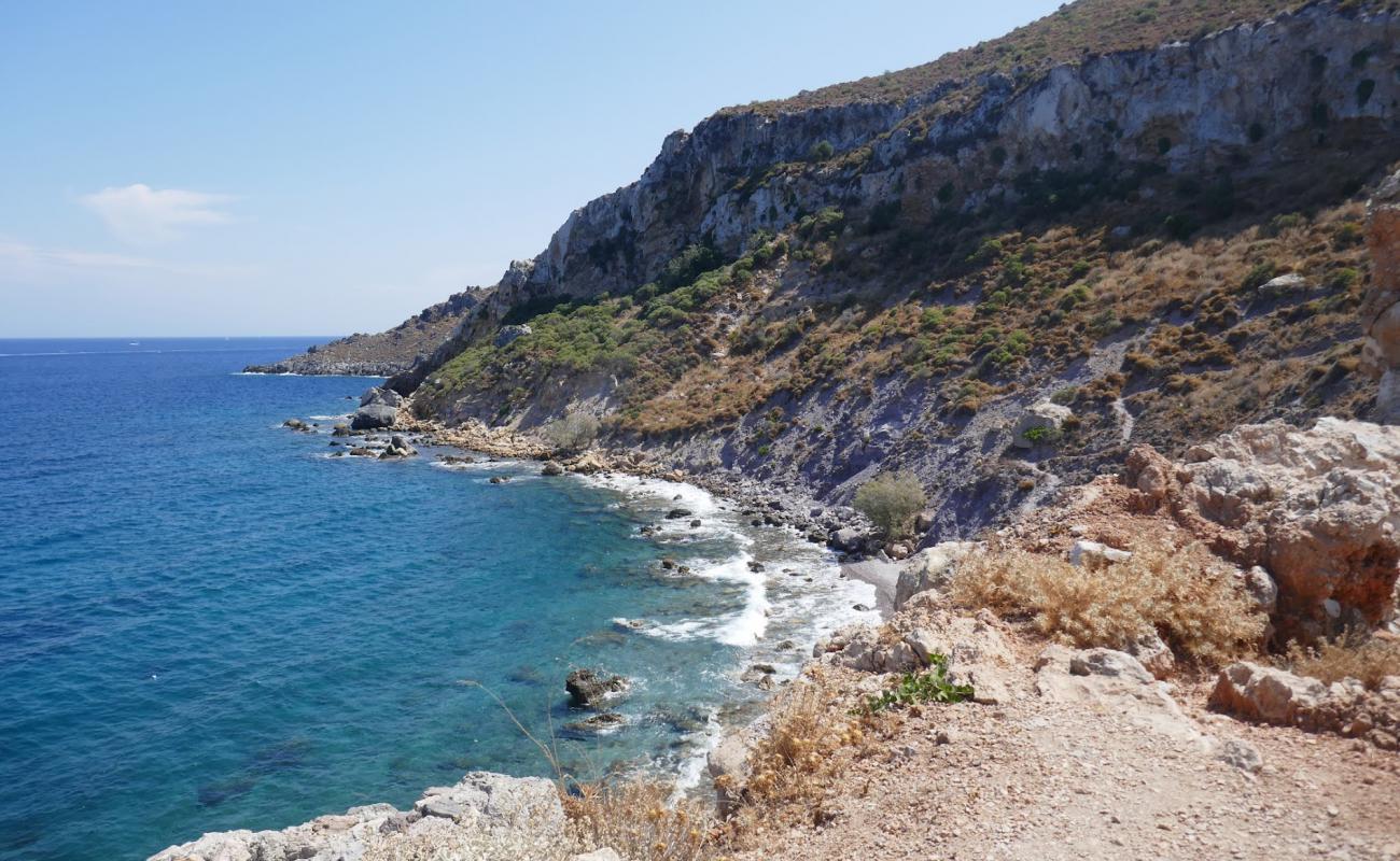 Photo of Faros Bar beach with gray sand &  rocks surface