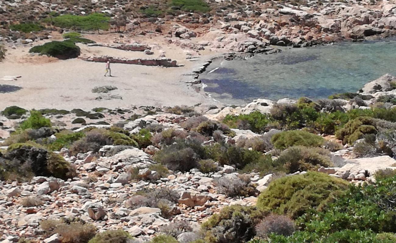 Photo of Paralía pnigménos with black sand & pebble surface