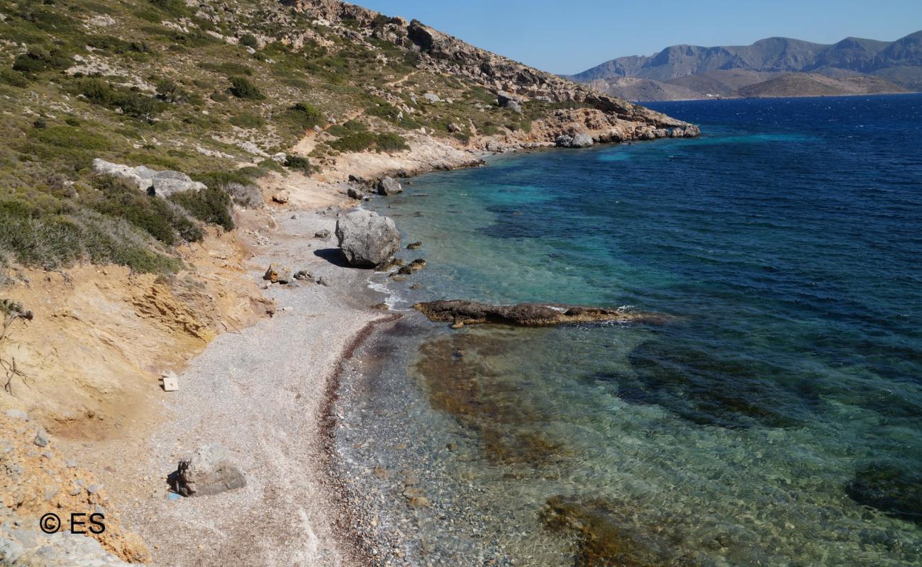 Photo of Paradise beach with gray sand &  pebble surface