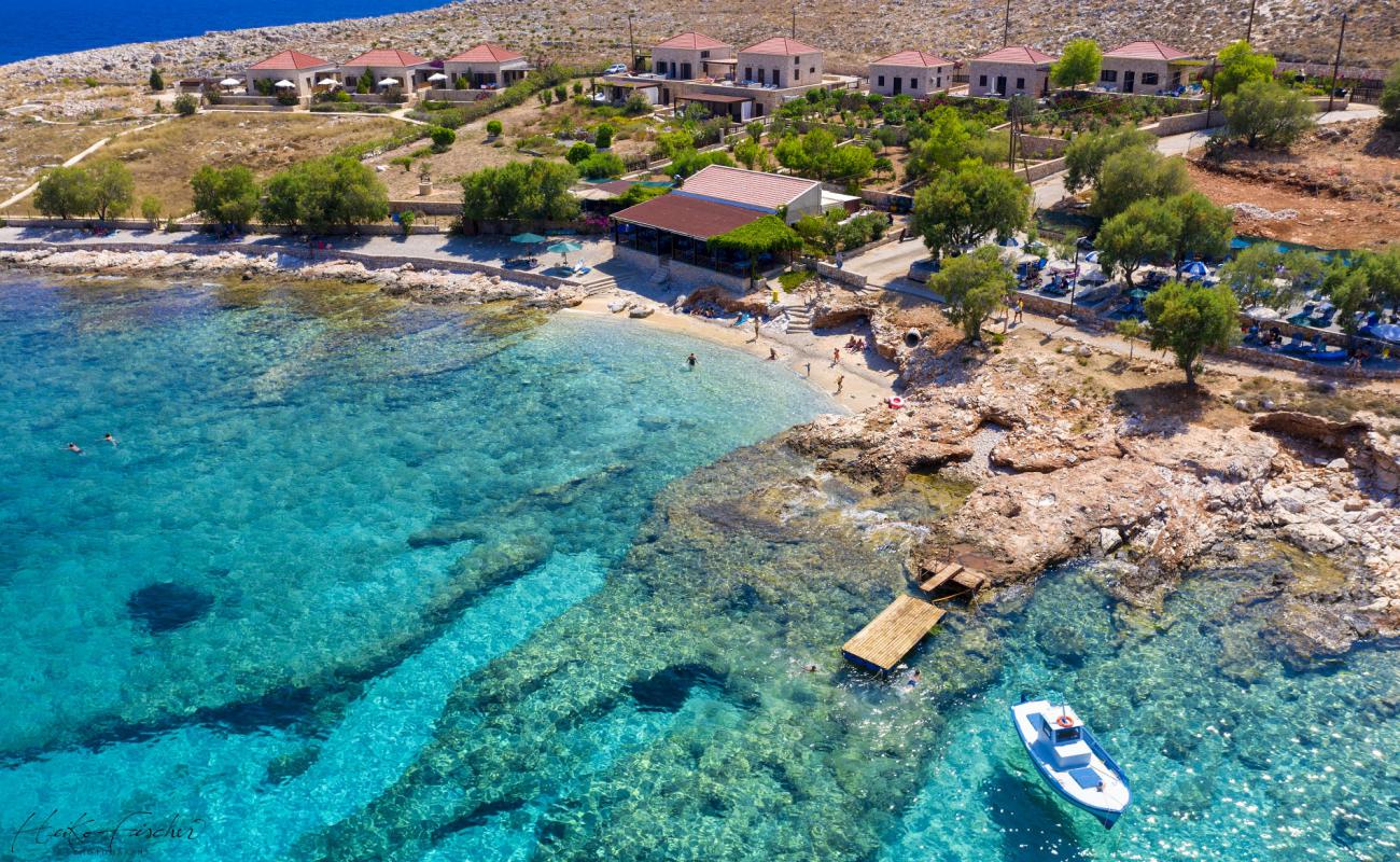 Photo of Ftenagia Beach with bright sand & rocks surface