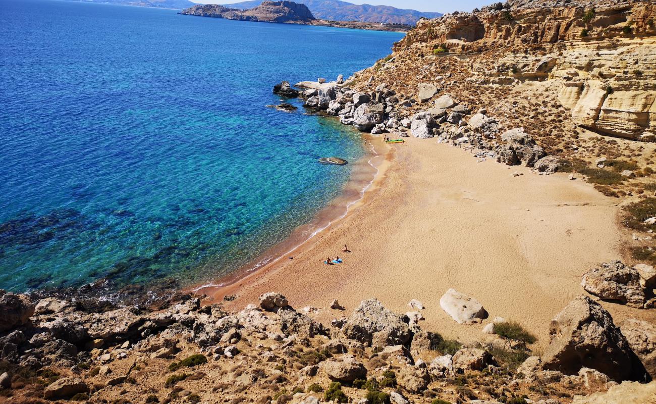 Photo of Red Sand Beach with brown sand surface