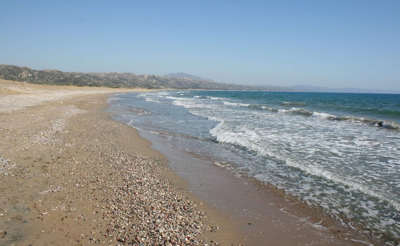 Photo of Paralia Apolakia with black sand & pebble surface