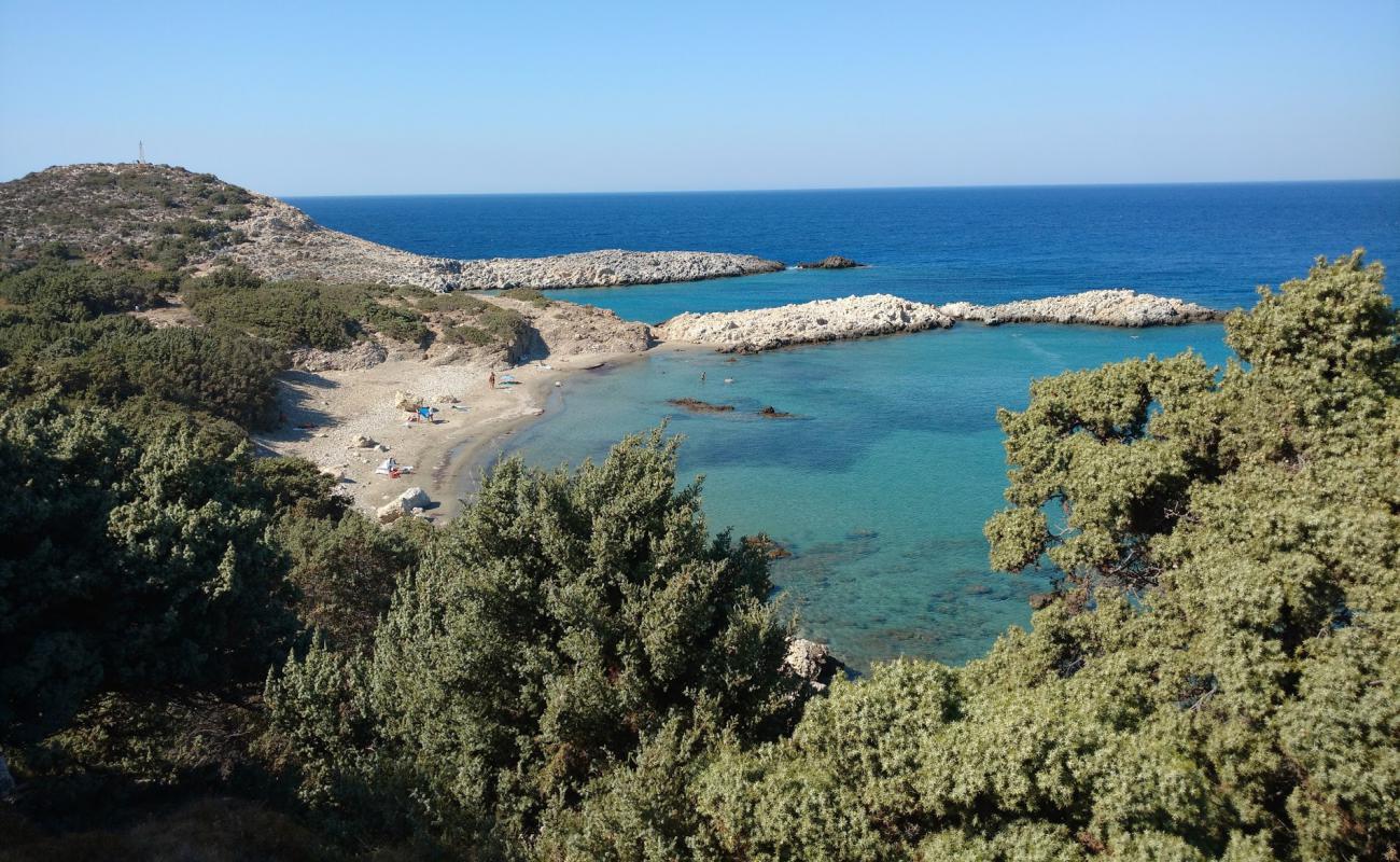 Photo of Agios Georgios with brown sand surface