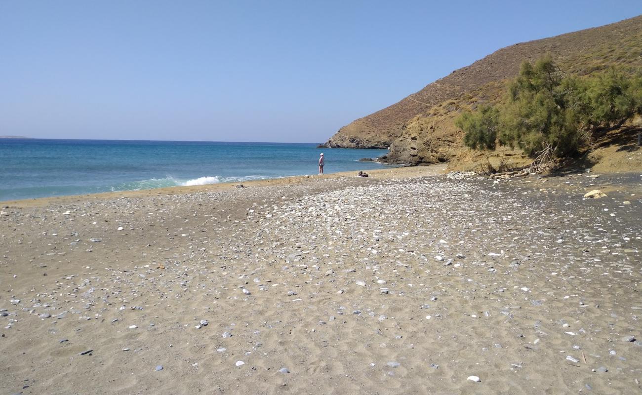 Photo of Megas Potamos with gray sand &  rocks surface