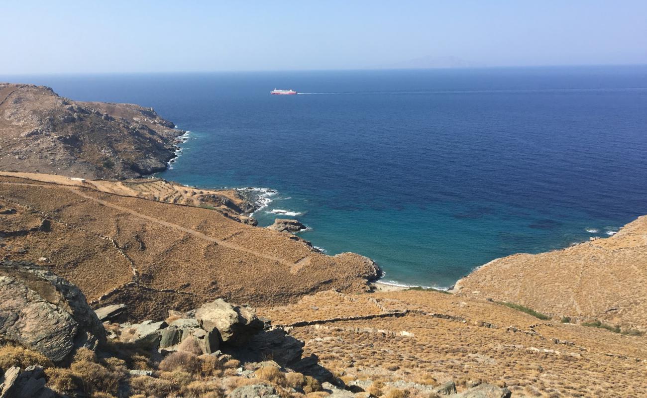 Photo of Yalia Beach with bright sand & rocks surface