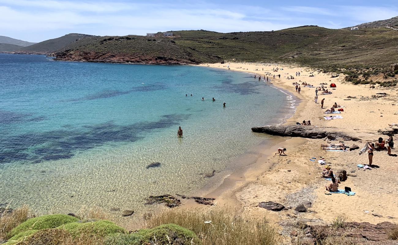 Photo of Agios Sostis beach with brown sand surface