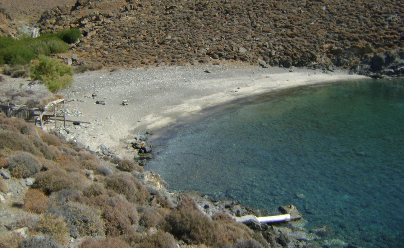 Photo of Megas Lakos with gray sand &  pebble surface