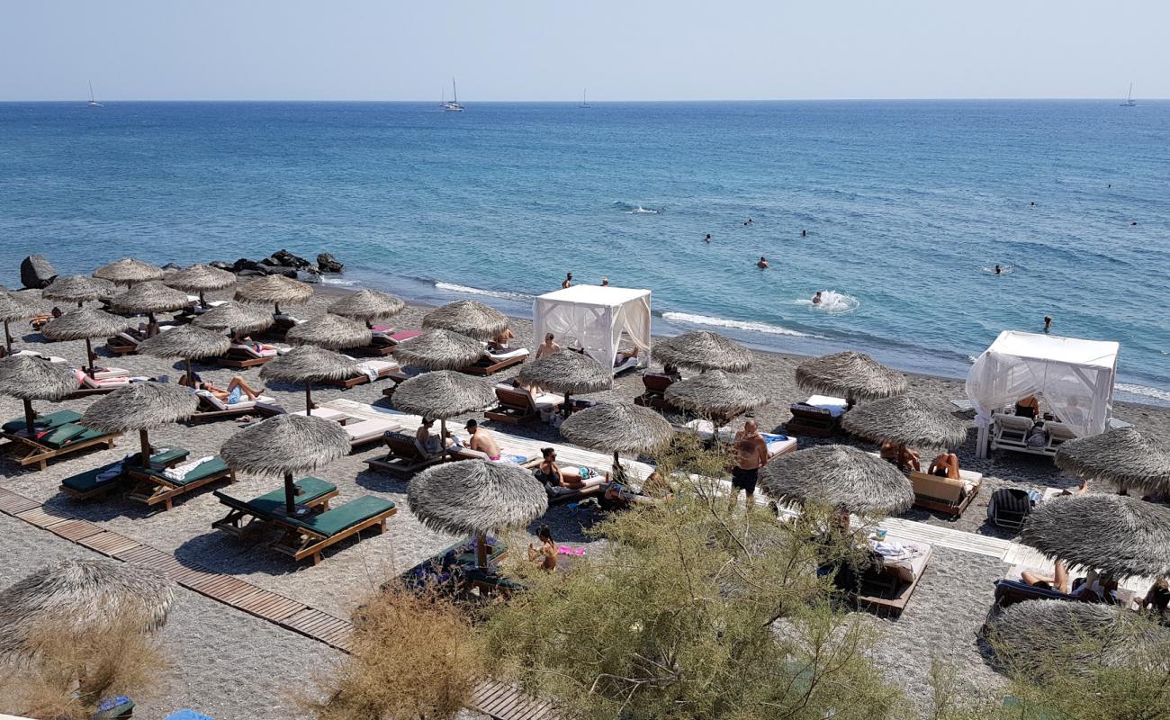 Photo of Theros beach with gray sand &  pebble surface