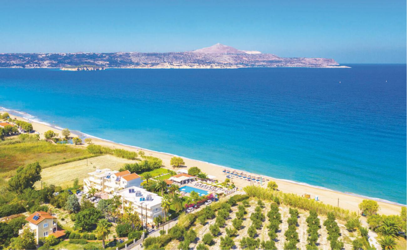 Photo of Kolatsos beach with brown sand surface