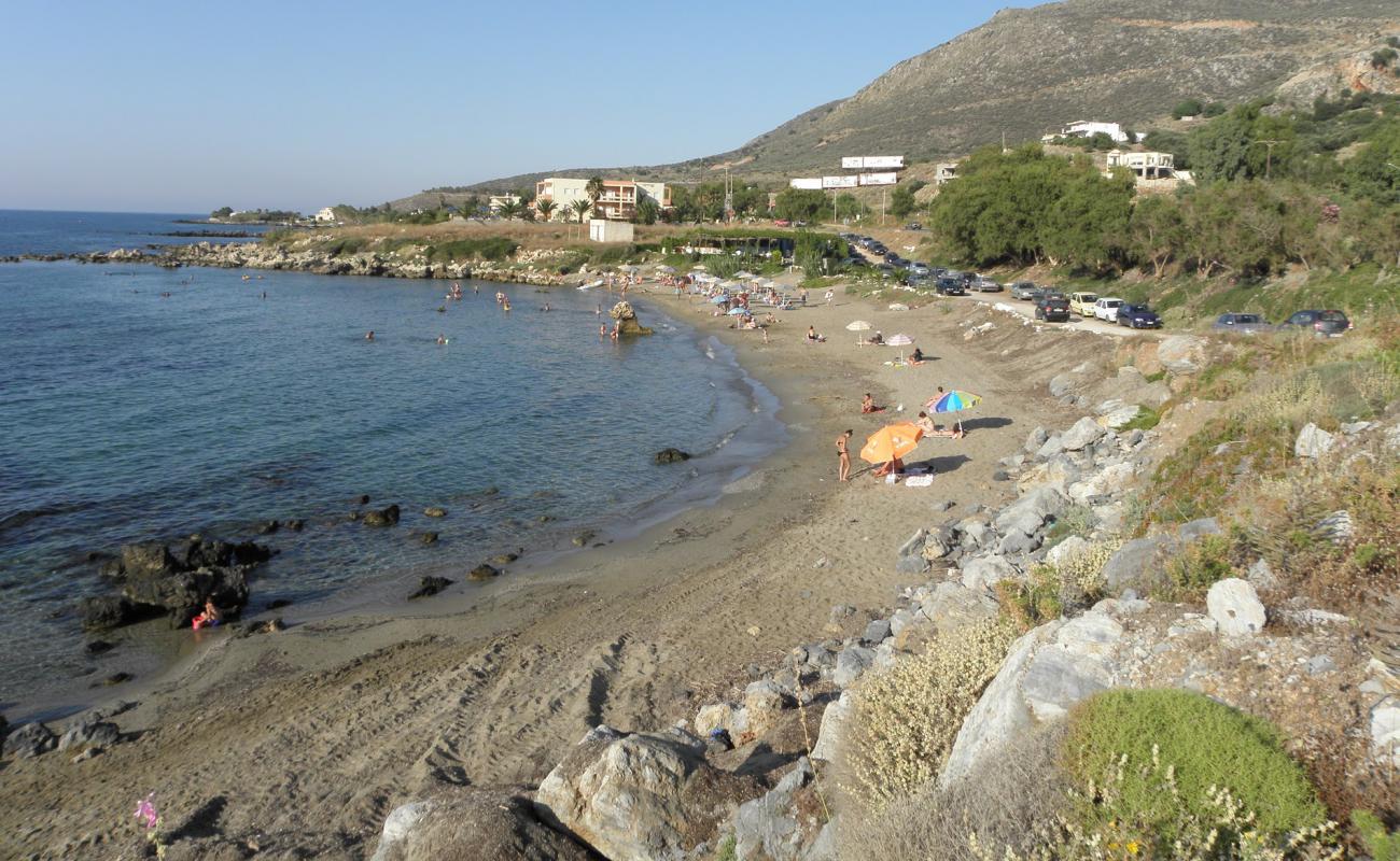 Photo of Petres beach II with brown sand surface