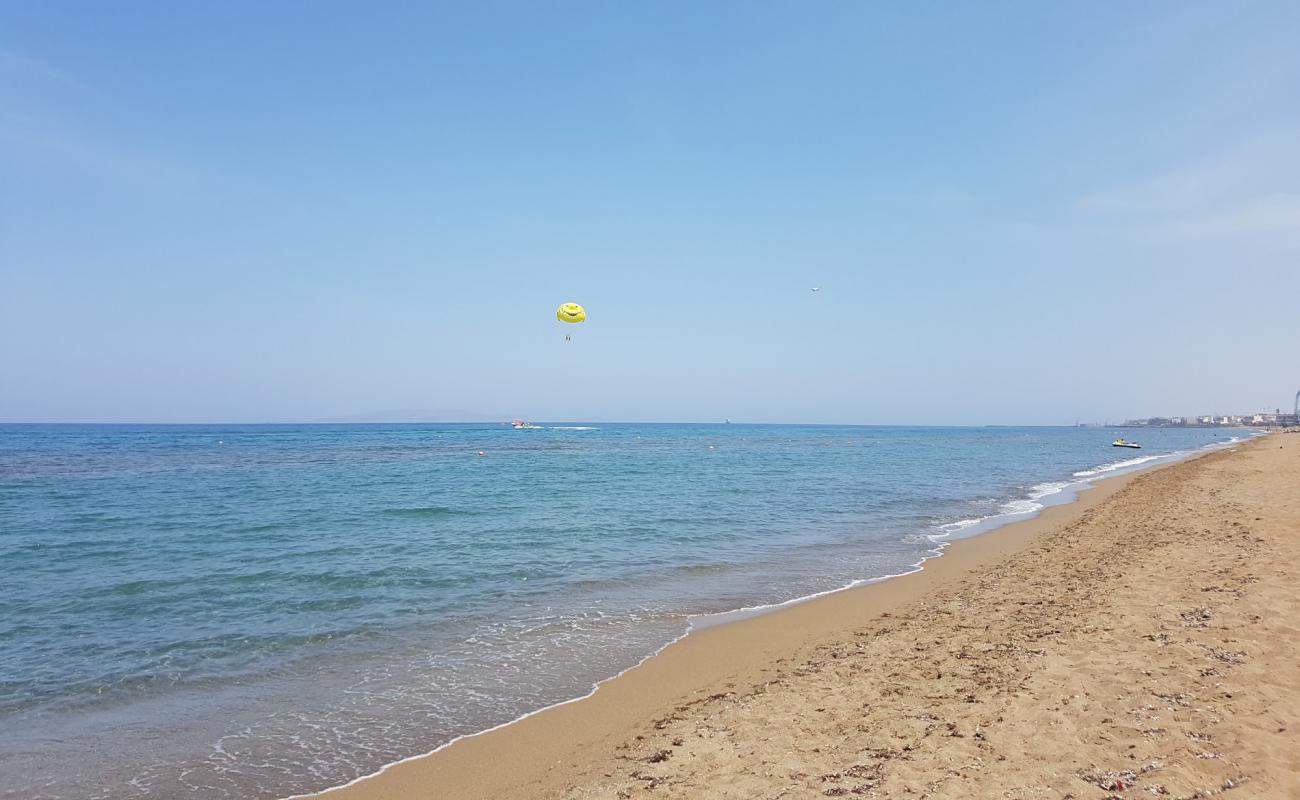 Photo of Ammoudara Beach II with brown sand surface