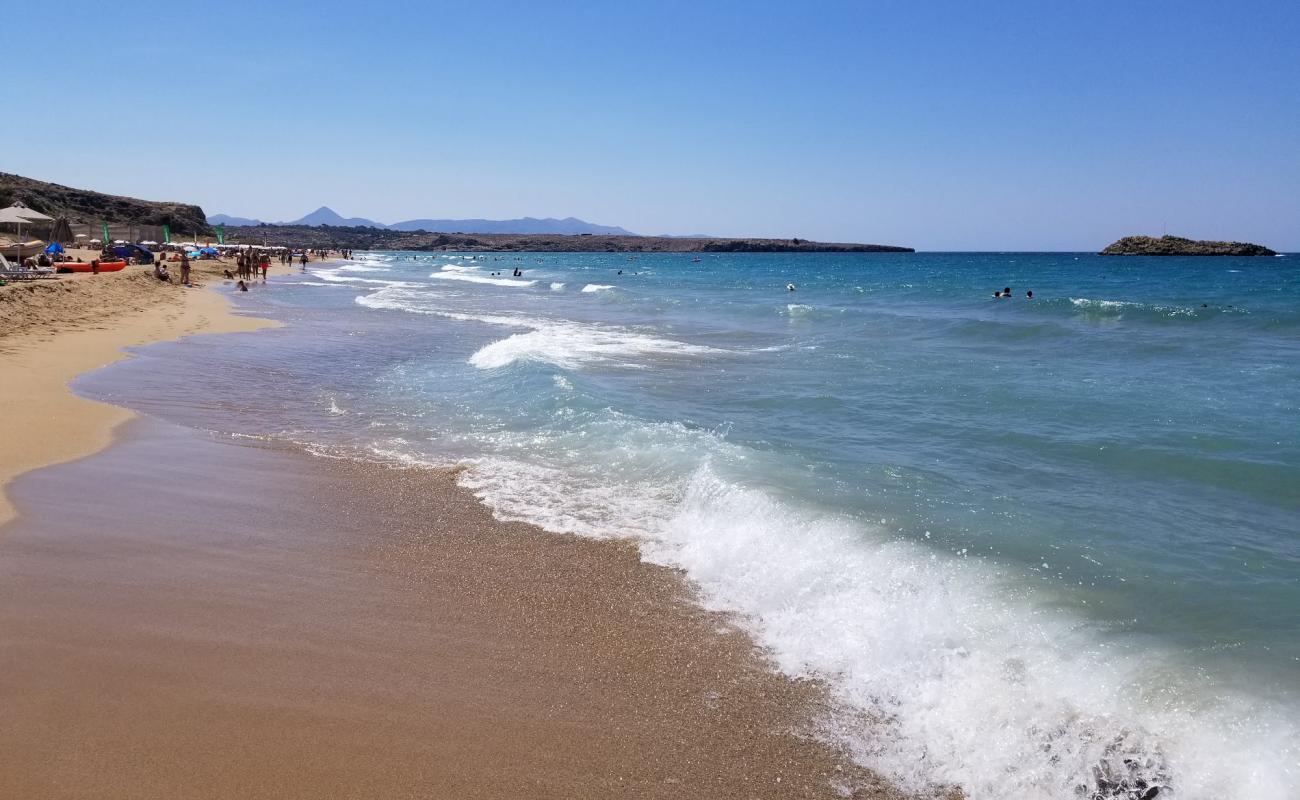 Photo of Amnissos beach with brown fine sand surface